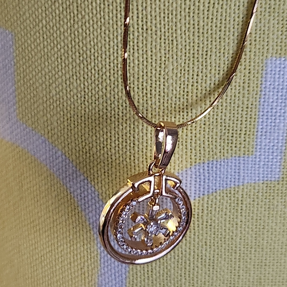 Gold tone pendant on a 24"  Gold filled chain